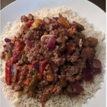 Meal Ground Beef With Mixed Peppers Over Rice.