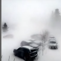 Cars Stocked in the Road Because of a Snow Storm